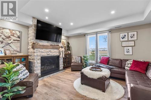 28 Road 9 West, Kingsville, ON - Indoor Photo Showing Living Room With Fireplace