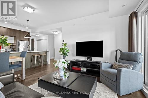 207 - 5025 Harvard Road, Mississauga, ON - Indoor Photo Showing Living Room