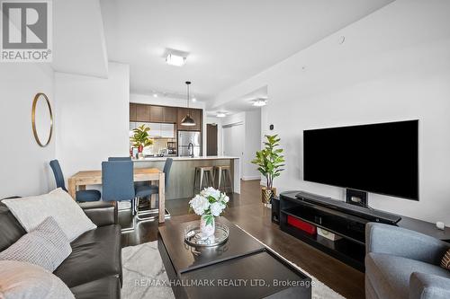 207 - 5025 Harvard Road, Mississauga, ON - Indoor Photo Showing Living Room