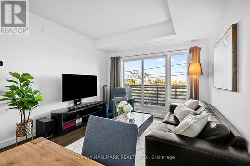 207 - 5025 Harvard Road, Mississauga, ON - Indoor Photo Showing Living Room