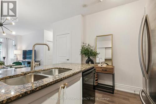 235 - 58 Marine Parade Drive, Toronto, ON - Indoor Photo Showing Kitchen With Double Sink