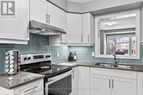 59 - 3400 Castle Rock Place, London, ON - Indoor Photo Showing Kitchen With Double Sink With Upgraded Kitchen