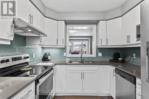 59 - 3400 Castle Rock Place, London, ON - Indoor Photo Showing Kitchen With Double Sink