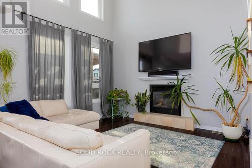 400 Tartaruga Lane, Ottawa, ON - Indoor Photo Showing Living Room With Fireplace