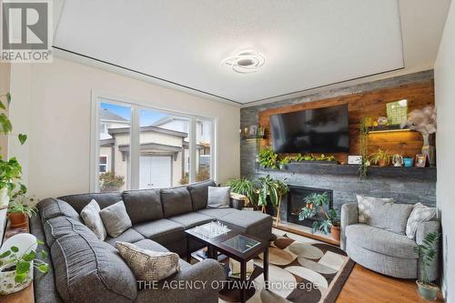 259 Trail Side Circle, Ottawa, ON - Indoor Photo Showing Living Room With Fireplace