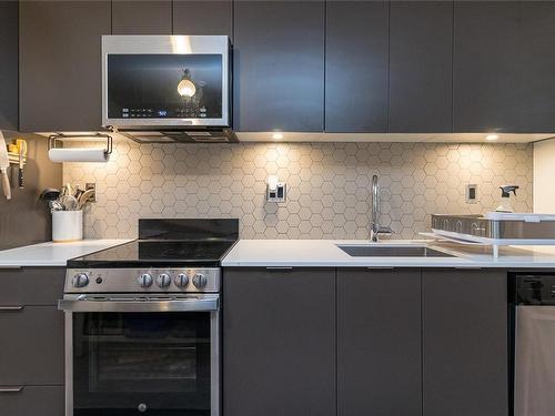 303-845 Johnson St, Victoria, BC - Indoor Photo Showing Kitchen With Double Sink