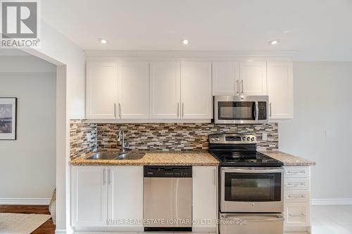 64 - 3265 South Millway, Mississauga (Erin Mills), ON - Indoor Photo Showing Kitchen With Stainless Steel Kitchen With Double Sink With Upgraded Kitchen