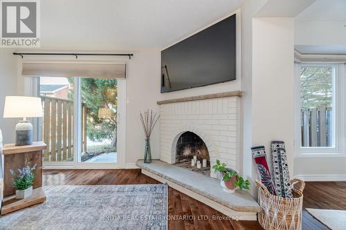 64 - 3265 South Millway, Mississauga (Erin Mills), ON - Indoor Photo Showing Living Room With Fireplace