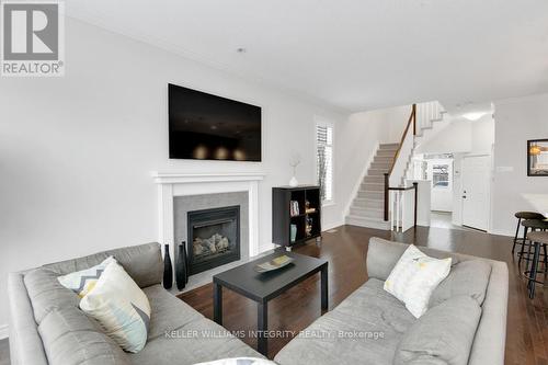 700 Hazelnut Crescent, Ottawa, ON - Indoor Photo Showing Living Room With Fireplace