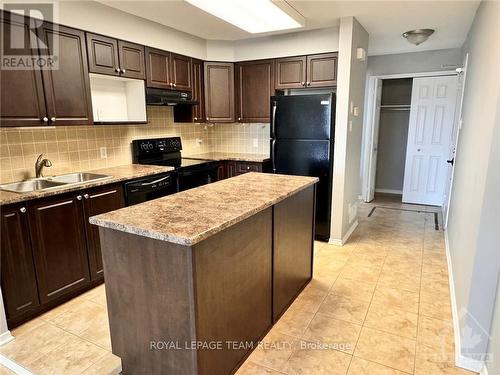 127 Keltie, Ottawa, ON - Indoor Photo Showing Kitchen With Double Sink