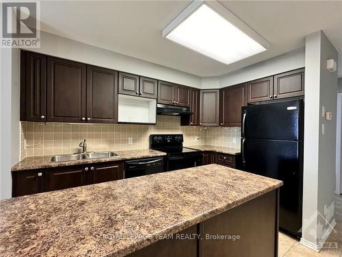 127 Keltie, Ottawa, ON - Indoor Photo Showing Kitchen With Double Sink