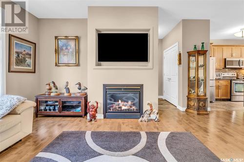 1637 Canterbury Lane, Regina, SK - Indoor Photo Showing Living Room With Fireplace