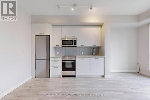 406 - 1630 Queen Street E, Toronto, ON - Indoor Photo Showing Kitchen