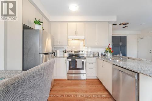 79 - 25 Knotsberry Circle, Brampton, ON - Indoor Photo Showing Kitchen With Stainless Steel Kitchen With Double Sink With Upgraded Kitchen