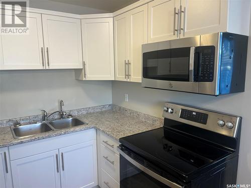 3856 7Th Avenue E, Regina, SK - Indoor Photo Showing Kitchen With Double Sink