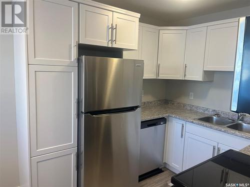 3856 7Th Avenue E, Regina, SK - Indoor Photo Showing Kitchen With Double Sink