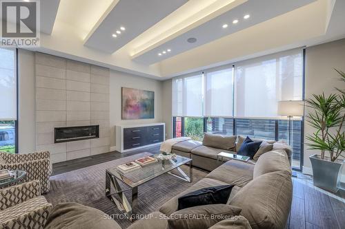 301 Waterstone Place, London, ON - Indoor Photo Showing Living Room With Fireplace