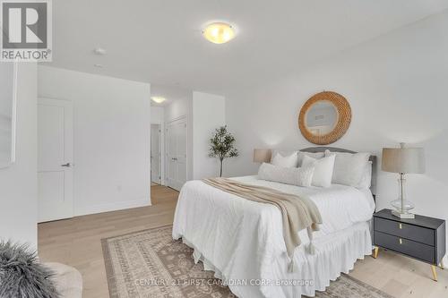 Hardwood upgrade - 716 - 480 Callaway Road S, London, ON - Indoor Photo Showing Bedroom