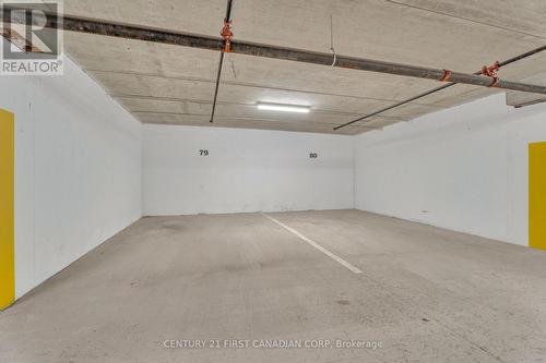 Two parallel underground parking - 716 - 480 Callaway Road S, London, ON - Indoor Photo Showing Garage