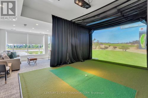 olf simulator - 716 - 480 Callaway Road S, London, ON - Indoor Photo Showing Other Room