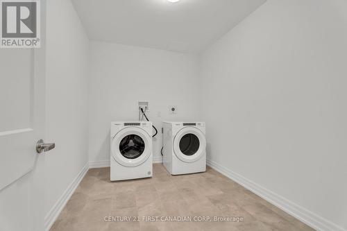 Large laundry with extra storage - 716 - 480 Callaway Road S, London, ON - Indoor Photo Showing Laundry Room