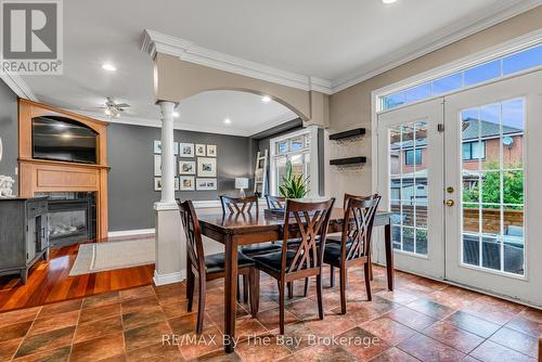 5335 Cosentino Gardens, Mississauga (Hurontario), ON - Indoor Photo Showing Dining Room With Fireplace