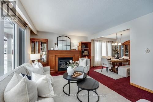 12 Strike Avenue, Clarington (Bowmanville), ON - Indoor Photo Showing Living Room With Fireplace