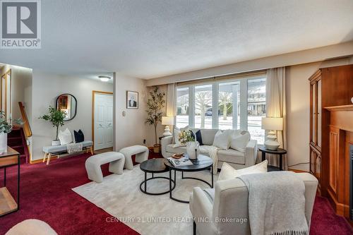 12 Strike Avenue, Clarington (Bowmanville), ON - Indoor Photo Showing Living Room With Fireplace