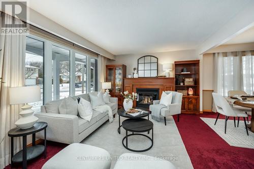 12 Strike Avenue, Clarington (Bowmanville), ON - Indoor Photo Showing Living Room With Fireplace