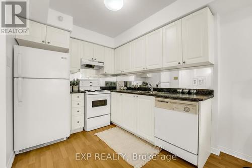 276 - 4975 Southampton Drive, Mississauga, ON - Indoor Photo Showing Kitchen With Double Sink