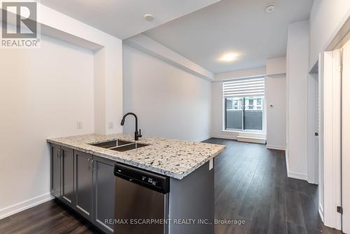 518 - 450 Dundas Street E, Hamilton, ON - Indoor Photo Showing Kitchen With Double Sink