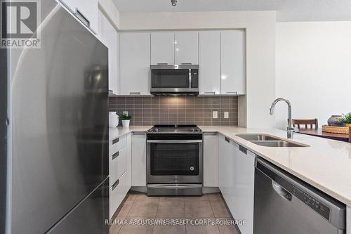 1811 - 5033 Four Springs Avenue, Mississauga, ON - Indoor Photo Showing Kitchen With Stainless Steel Kitchen With Double Sink With Upgraded Kitchen