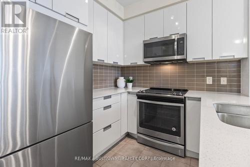 1811 - 5033 Four Springs Avenue, Mississauga, ON - Indoor Photo Showing Kitchen With Stainless Steel Kitchen With Double Sink With Upgraded Kitchen