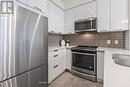 1811 - 5033 Four Springs Avenue, Mississauga, ON  - Indoor Photo Showing Kitchen With Stainless Steel Kitchen With Double Sink With Upgraded Kitchen 