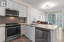 1811 - 5033 Four Springs Avenue, Mississauga, ON  - Indoor Photo Showing Kitchen With Stainless Steel Kitchen With Double Sink With Upgraded Kitchen 