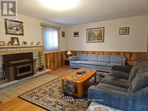 18 Goa Court, Toronto, ON - Indoor Photo Showing Living Room With Fireplace