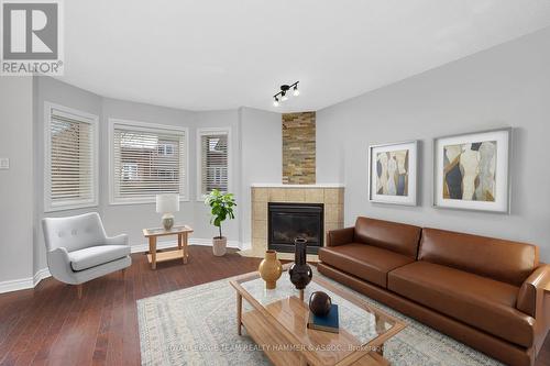 232 Bookton Place, Ottawa, ON - Indoor Photo Showing Living Room With Fireplace