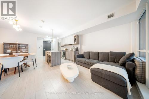 312 - 31 Tippett Road, Toronto, ON - Indoor Photo Showing Living Room