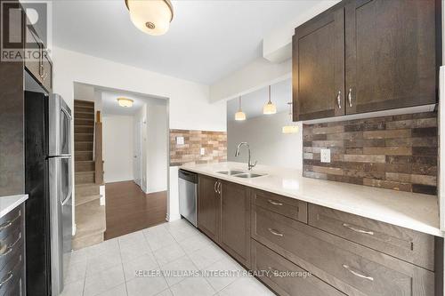 310 Pumpkinseed Crescent, Ottawa, ON - Indoor Photo Showing Kitchen With Double Sink