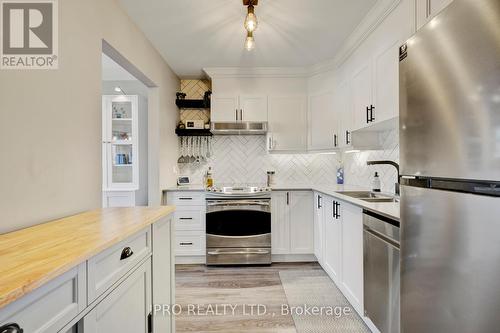 3 - 985 Limeridge Road E, Hamilton, ON - Indoor Photo Showing Kitchen With Stainless Steel Kitchen With Double Sink With Upgraded Kitchen