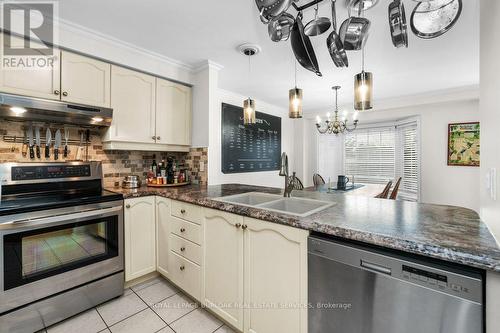 133 - 3333 New Street, Burlington, ON - Indoor Photo Showing Kitchen With Double Sink With Upgraded Kitchen