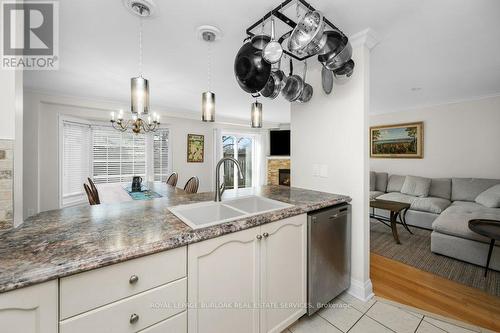 133 - 3333 New Street, Burlington, ON - Indoor Photo Showing Kitchen With Double Sink With Upgraded Kitchen