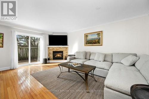 133 - 3333 New Street, Burlington, ON - Indoor Photo Showing Living Room With Fireplace