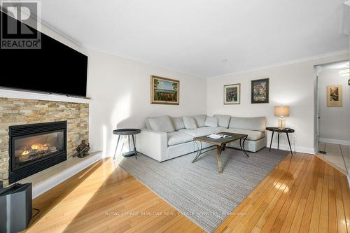 133 - 3333 New Street, Burlington, ON - Indoor Photo Showing Living Room With Fireplace