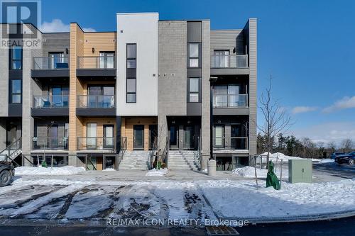 68 - 261 Woodbine Avenue W, Kitchener, ON - Outdoor With Balcony With Facade