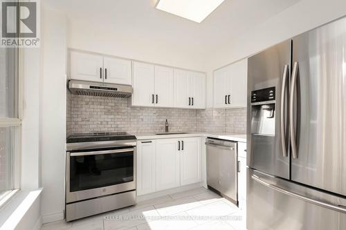 452 - 24 Southport Street, Toronto, ON - Indoor Photo Showing Kitchen With Upgraded Kitchen