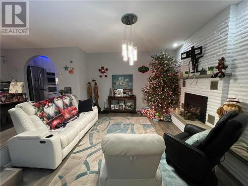 3182 Leo Avenue, Val Caron, ON - Indoor Photo Showing Living Room With Fireplace