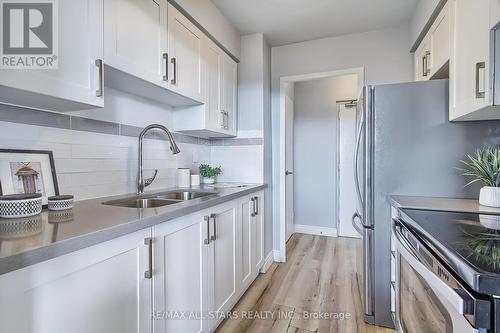 802 - 3311 Kingston Road, Toronto, ON - Indoor Photo Showing Kitchen With Double Sink