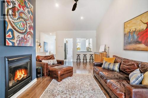 418 Statewood Drive, Ottawa, ON - Indoor Photo Showing Living Room With Fireplace