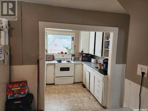 702 Athol Street, Regina, SK - Indoor Photo Showing Kitchen With Double Sink